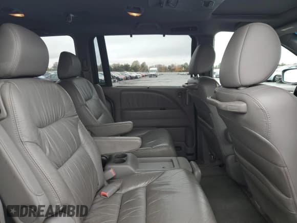 ✅ 2009 Honda Odyssey EX-L • VIN: 5FNRL38749B031641 • Lot: 90673625. Wystawiony na Copart z przebiegiem 223 791 mil. Bezpłatny archiwum sprzedaży aukcyjnych z USA i szczegółowy raport historii pojazdu na DreamBid. Zdjęcie 11.