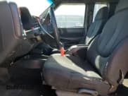 ✅ 2003 GMC Sonoma SLS • VIN: 1GTCS19X838202815 • Lot: 57329415. Wystawiony na Copart z przebiegiem 148 799 mil. Bezpłatny archiwum sprzedaży aukcyjnych z USA i szczegółowy raport historii pojazdu na DreamBid. Zdjęcie 7.