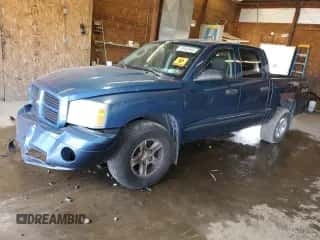 2006 Dodge Dakota SLT с VIN 1D7HW48NX6S606210, выставлен на аукционе Copart как лот 70982544 с пробегом 145 669 миль миль и Списание • Salvage title. История ставок и продаж доступна на DreamBid. Изображение 1.