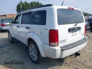 ✅ 2011 Dodge Nitro Heat • VIN: 1D4PU4GX0BW564036 • Lot: 42855542. Listed on IAAI with 156,845 mi. Free auction sales archive from the USA and detailed vehicle history report at DreamBid. Image 3.