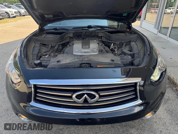 ✅ 2014 Infiniti QX70 • VIN: JN8CS1MW1EM411715 • Lot: 65465775. Wystawiony na Copart z przebiegiem 180 472 mil. Bezpłatny archiwum sprzedaży aukcyjnych z USA i szczegółowy raport historii pojazdu na DreamBid. Zdjęcie 7.