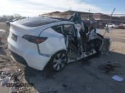 ✅ 2022 Tesla Model Y Long Range • VIN: 7SAYGDEE4NF432760 • Lot: 43765345. Wystawiony na IAAI z przebiegiem Nie podano. Bezpłatny archiwum sprzedaży aukcyjnych z USA i szczegółowy raport historii pojazdu na DreamBid. Zdjęcie 4.