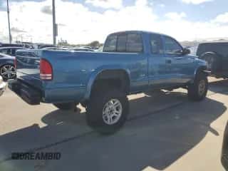 2003 Dodge Dakota z VIN 1D7HG12X93S267179, wystawiony jako Copart lot #74291174 z przebiegiem Nie podano mil oraz Nie do naprawy • Non repairable. Historia ofert i sprzedaży dostępna na DreamBid. Obrazek 3.