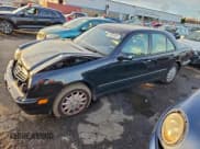 ✅ 2001 Mercedes-Benz E 320/430 4 Matic • VIN: WDBJF82J21X045584 • Lot: 93833835. Listed on Copart with 187,141 mi. Free auction sales archive from the USA and detailed vehicle history report at DreamBid. Image 1.