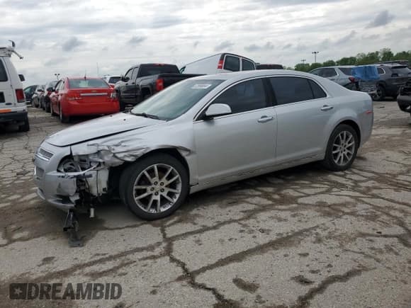 ✅ 2012 Chevrolet Malibu LTZ • VIN: 1G1ZG5E72CF117904 • Lot: 52998884. Listed on Copart with 138,605 mi. Free auction sales archive from the USA and detailed vehicle history report at DreamBid. Image 1.
