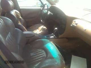 ✅ 1998 Pontiac Bonneville SE • VIN: 1G2HX52K9W4234301 • Lot: 31038690. Wystawiony na IAAI z przebiegiem 320 858 mil. Bezpłatny archiwum sprzedaży aukcyjnych z USA i szczegółowy raport historii pojazdu na DreamBid. Zdjęcie 5.