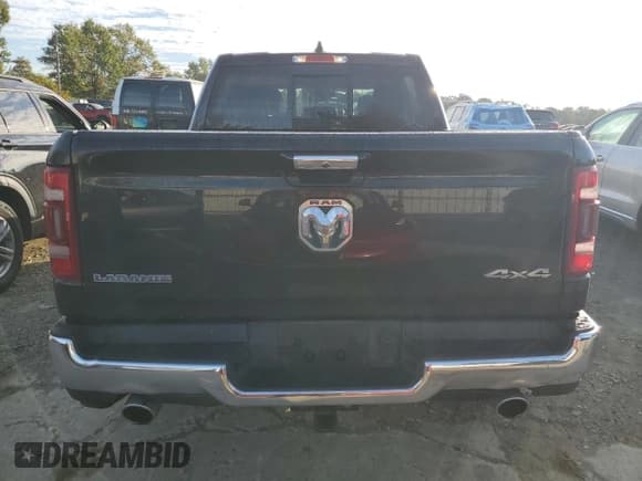 ✅ 2021 Ram 1500 Laramie • VIN: 1C6SRFJT3MN676601 • Лот: 84864265. Опубликован ранее на Copart с пробегом 124 485 миль. Бесплатный доступ к архиву аукционных продаж из США и подробный отчёт об истории автомобиля на DreamBid. Изображение 6.