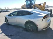 ✅ 2024 Toyota Prius LE • VIN: JTDACAAUXR3046093 • Lot: 90372365. Wystawiony na Copart z przebiegiem 15 281 mil. Bezpłatny archiwum sprzedaży aukcyjnych z USA i szczegółowy raport historii pojazdu na DreamBid. Zdjęcie 2.