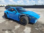 ✅ 2023 Porsche 911 Turbo • VIN: WP0AD2A97PS258306 • Lot: 61753825. Listed on Copart with 2,879 mi. Free auction sales archive from the USA and detailed vehicle history report at DreamBid. Image 4.