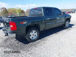 2013 Chevrolet Silverado 1500 LT with VIN 3GCPKSE72DG258905, listed as a IAAI auction lot 43492550 with 170,811 mi miles and . Bid and sale history available at DreamBid. Image 4.