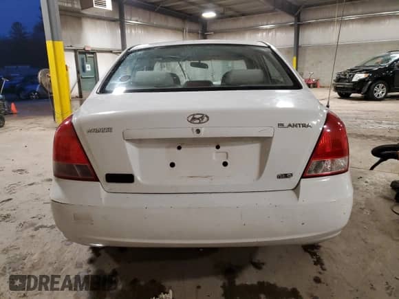 2003 Hyundai Elantra GLS z VIN KMHDN45D23U489919, wystawiony jako Copart lot #83390934 z przebiegiem Nie podano mil oraz Szkoda całkowita • Salvage title. Historia ofert i sprzedaży dostępna na DreamBid. Obrazek 6.