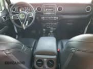 ✅ 2022 Jeep Wrangler Unlimited Sahara Altitude • VIN: 1C4HJXEG1NW254593 • Lot: 64974425. Listed on Copart with 50,215 mi. Free auction sales archive from the USA and detailed vehicle history report at DreamBid. Image 8.