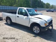 ✅ 2004 Toyota Tacoma • VIN: 5TENL42N74Z412936 • Lot: 42039092. Listed on IAAI with 289,926 mi. Free auction sales archive from the USA and detailed vehicle history report at DreamBid. Image 1.