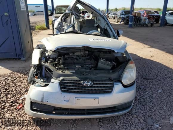 2011 Hyundai Accent GLS z VIN KMHCN4AC5BU607095, wystawiony jako Copart lot #75853554 z przebiegiem 212 818 mil mil oraz Szkoda całkowita • Salvage title. Historia ofert i sprzedaży dostępna na DreamBid. Obrazek 5.