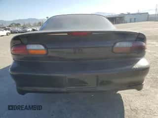 2001 Chevrolet Camaro z VIN 2G1FP22K212133755, wystawiony jako Copart lot #50259825 z przebiegiem 78 287 mil mil oraz Czysty tytuł • Clean title. Historia ofert i sprzedaży dostępna na DreamBid. Obrazek 6.