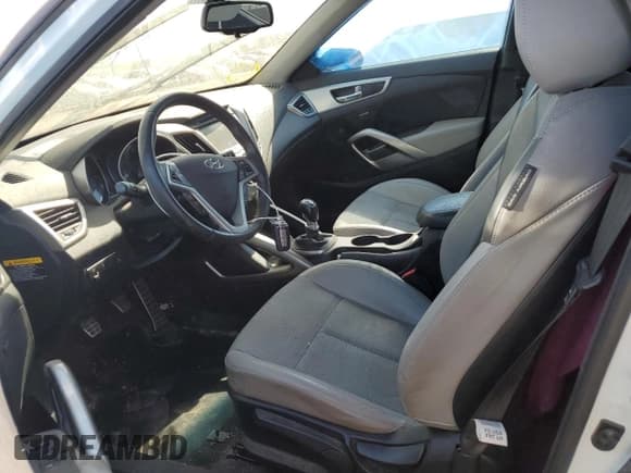 ✅ 2013 Hyundai Veloster w/Black Int • VIN: KMHTC6AD4DU144668 • Lot: 44434685. Wystawiony na Copart z przebiegiem 74 941 mil. Bezpłatny archiwum sprzedaży aukcyjnych z USA i szczegółowy raport historii pojazdu na DreamBid. Zdjęcie 7.