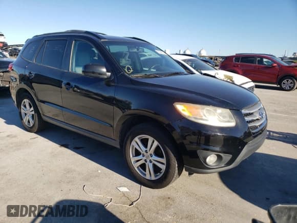 ✅ 2012 Hyundai Santa Fe SE • VIN: 5XYZH4AG5CG122256 • Lot: 80942864. Listed on Copart with 191,971 mi. Free auction sales archive from the USA and detailed vehicle history report at DreamBid. Image 4.
