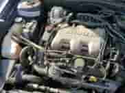 2000 Chevrolet Malibu LS z VIN 1G1NE52J4Y6191661, wystawiony jako Copart lot #83707804 z przebiegiem 52 787 mil mil oraz Szkoda całkowita • Salvage title. Historia ofert i sprzedaży dostępna na DreamBid. Obrazek 13.