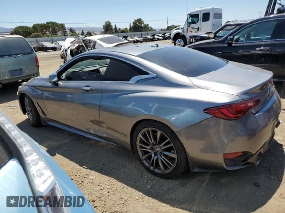 ✅ 2018 Infiniti Q60 Sport • VIN: JN1EV7EK5JM340414 • Лот: 64520395. Опубликован ранее на Copart с пробегом 74 002 миль. Бесплатный доступ к архиву аукционных продаж из США и подробный отчёт об истории автомобиля на DreamBid. Изображение 2.