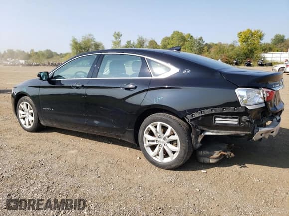 ✅ 2019 Chevrolet Impala LT • VIN: 1G11Z5S35KU122579 • Лот: 71239934. Опубликован ранее на Copart с пробегом 129 114 миль. Бесплатный доступ к архиву аукционных продаж из США и подробный отчёт об истории автомобиля на DreamBid. Изображение 2.