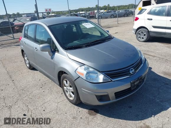 ✅ 2012 Nissan Versa S • VIN: 3N1BC1CP9CK801573 • Lot: 43251441. Listed on IAAI with 136,411 mi. Free auction sales archive from the USA and detailed vehicle history report at DreamBid. Image 1.