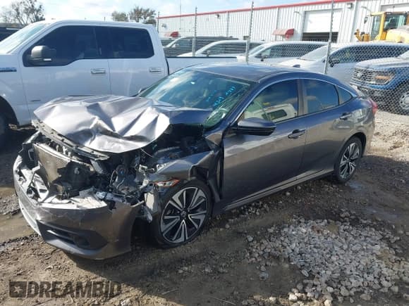 ✅ 2018 Honda Civic EX-T • VIN: JHMFC1F36JX027526 • Lot: 43692489. Listed on IAAI with 95,477 mi. Free auction sales archive from the USA and detailed vehicle history report at DreamBid. Image 2.