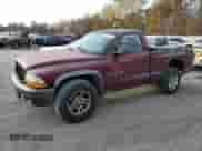 2002 Dodge Dakota z VIN 1B7FL16X22S668515, wystawiony jako Copart lot #78352644 z przebiegiem 214 222 mil mil oraz Szkoda całkowita • Salvage title. Historia ofert i sprzedaży dostępna na DreamBid. Obrazek 1.
