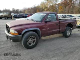 2002 Dodge Dakota z VIN 1B7FL16X22S668515, wystawiony jako Copart lot #78352644 z przebiegiem 214 222 mil mil oraz Szkoda całkowita • Salvage title. Historia ofert i sprzedaży dostępna na DreamBid. Obrazek 1.