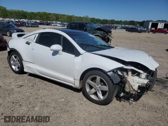 ✅ 2011 Mitsubishi Eclipse GT • VIN: 4A31K3DT3BE012635 • Lot: 52537435. Listed on Copart with 100,292 mi. Free auction sales archive from the USA and detailed vehicle history report at DreamBid. Image 4.