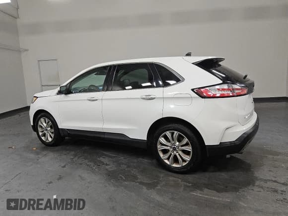 ✅ 2021 Ford Edge Titanium • VIN: 2FMPK4K9XMBA27105 • Lot: 90824715. Wystawiony na Copart z przebiegiem 210 038 mil. Bezpłatny archiwum sprzedaży aukcyjnych z USA i szczegółowy raport historii pojazdu na DreamBid. Zdjęcie 2.