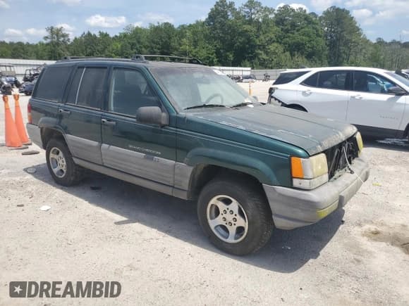 ✅ 1997 Jeep Grand Cherokee TSi • VIN: 1J4FX58S9VC739621 • Lot: 54962855. Wystawiony na Copart z przebiegiem 256 337 mil. Bezpłatny archiwum sprzedaży aukcyjnych z USA i szczegółowy raport historii pojazdu na DreamBid. Zdjęcie 4.
