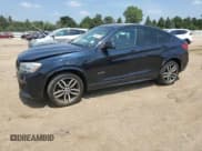 ✅ 2015 BMW X4 xDrive28i • VIN: 5UXXW3C59F0M89365 • Lot: 65380225. Listed on Copart with 96,089 mi. Free auction sales archive from the USA and detailed vehicle history report at DreamBid. Image 1.