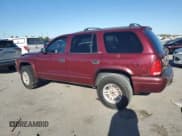 ✅ 2002 Dodge Durango SLT • VIN: 1B4HS48N32F146409 • Лот: 86816555. Опубликован ранее на Copart с пробегом 243 277 миль. Бесплатный доступ к архиву аукционных продаж из США и подробный отчёт об истории автомобиля на DreamBid. Изображение 2.