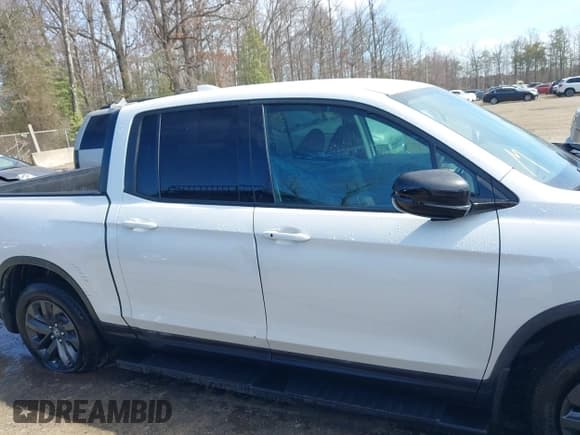 ✅ 2022 Honda Ridgeline Sport • VIN: 5FPYK3F12NB009135 • Lot: 41705000. Listed on IAAI with 50,551 mi. Free auction sales archive from the USA and detailed vehicle history report at DreamBid. Image 13.