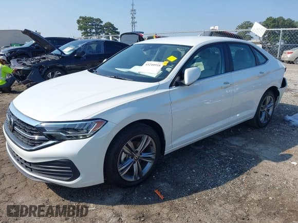 ✅ 2024 Volkswagen Jetta SE • VIN: 3VWEM7BU0RM059737 • Lot: 43240918. Listed on IAAI with 26,936 mi. Free auction sales archive from the USA and detailed vehicle history report at DreamBid. Image 2.