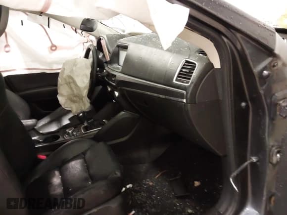 ✅ 2016 Mazda CX-5 Grand Touring • VIN: JM3KE4DY4G0679077 • Lot: 43560857. Wystawiony na IAAI z przebiegiem 83 348 mil. Bezpłatny archiwum sprzedaży aukcyjnych z USA i szczegółowy raport historii pojazdu na DreamBid. Zdjęcie 5.