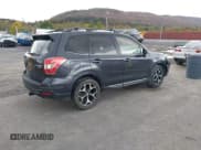 ✅ 2015 Subaru Forester XT Touring • VIN: JF2SJGWC7FH405851 • Lot: 43475831. Listed on IAAI with 95,654 mi. Free auction sales archive from the USA and detailed vehicle history report at DreamBid. Image 4.