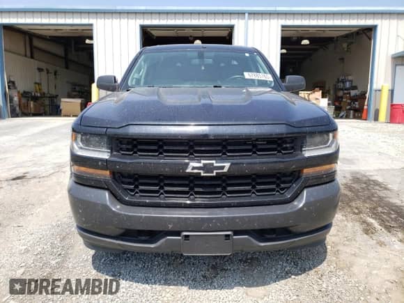 2018 Chevrolet Silverado 1500 Work Truck with VIN 1GCVKNEC3JZ337968, listed as a Copart auction lot 67885765 with 118,179 mi miles and Salvage title. Bid and sale history available at DreamBid. Image 5.