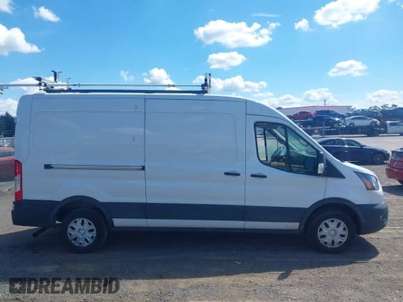 ✅ 2023 Ford Transit Cargo • VIN: 1FTBR1C83PKA34468 • Лот: 43081682. Опубликован ранее на IAAI с пробегом 83 741 миль. Бесплатный доступ к архиву аукционных продаж из США и подробный отчёт об истории автомобиля на DreamBid. Изображение 13.