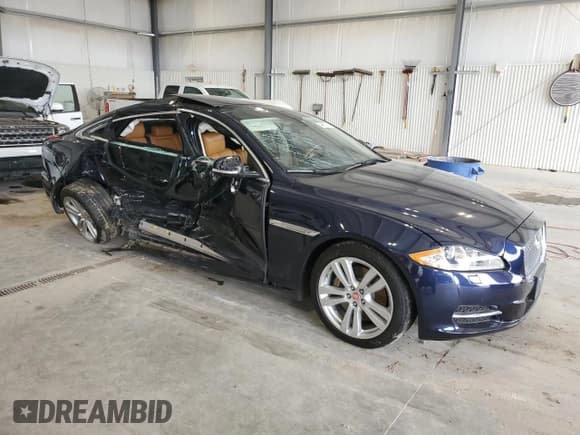 ✅ 2014 Jaguar XJ Portfolio • VIN: SAJWJ2GD1E8V61328 • Лот: 64867705. Опубликован ранее на Copart с пробегом 78 024 миль. Бесплатный доступ к архиву аукционных продаж из США и подробный отчёт об истории автомобиля на DreamBid. Изображение 4.