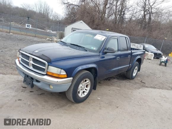 ✅ 2003 Dodge Dakota SLT • VIN: 1D7HL48X23S261258 • Lot: 41362485. Wystawiony na IAAI z przebiegiem 143 397 mil. Bezpłatny archiwum sprzedaży aukcyjnych z USA i szczegółowy raport historii pojazdu na DreamBid. Zdjęcie 2.