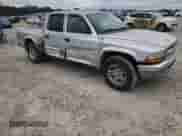 2003 Dodge Dakota SLT z VIN 1D7HL48X13S151334, wystawiony jako Copart lot #82016764 z przebiegiem 216 281 mil mil oraz Szkoda całkowita • Salvage title. Historia ofert i sprzedaży dostępna na DreamBid. Obrazek 10.
