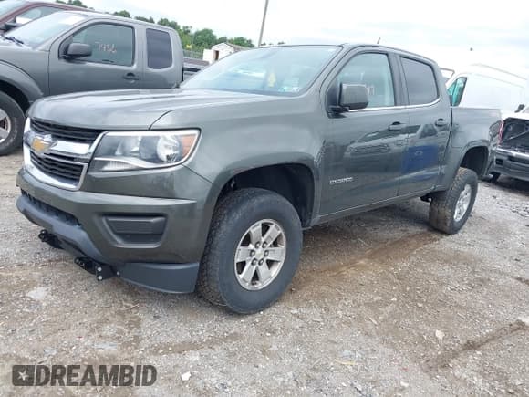 ✅ 2018 Chevrolet Colorado 4WD Work Truck • VIN: 1GCGTBENXJ1107896 • Лот: 43027317. Опубликован ранее на IAAI с пробегом 104 301 миль. Бесплатный доступ к архиву аукционных продаж из США и подробный отчёт об истории автомобиля на DreamBid. Изображение 2.