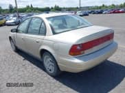 ✅ 1999 Saturn SL • VIN: 1G8ZK5275XZ283178 • Lot: 42303549. Wystawiony na IAAI z przebiegiem 216 776 mil. Bezpłatny archiwum sprzedaży aukcyjnych z USA i szczegółowy raport historii pojazdu na DreamBid. Zdjęcie 3.