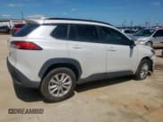 ✅ 2023 Toyota Corolla Cross LE • VIN: 7MUCAAAG4PV070612 • Lot: 58989675. Listed on Copart with 11,807 mi. Free auction sales archive from the USA and detailed vehicle history report at DreamBid. Image 3.