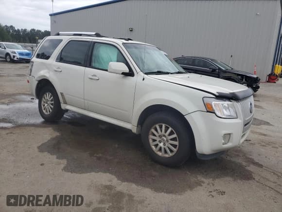 ✅ 2011 Mercury Mariner Premier • VIN: 4M2CN8HG9BKJ04048 • Lot: 86261395. Listed on Copart with 326,908 mi. Free auction sales archive from the USA and detailed vehicle history report at DreamBid. Image 4.