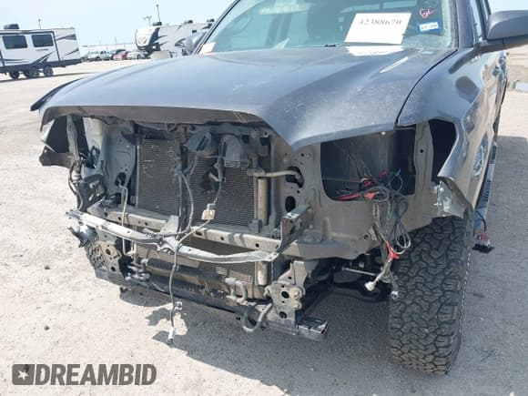 ✅ 2021 Toyota Tacoma SR • VIN: 5TFCZ5AN5MX258408 • Лот: 42388670. Опубликован ранее на IAAI с пробегом 73 611 миль. Бесплатный доступ к архиву аукционных продаж из США и подробный отчёт об истории автомобиля на DreamBid. Изображение 6.