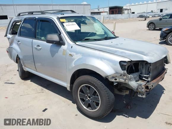 2010 Mercury Mariner z VIN 4M2CN8B75AKJ13322, wystawiony jako IAAI lot #42832064 z przebiegiem 205 074 mil mil oraz . Historia ofert i sprzedaży dostępna na DreamBid. Obrazek 1.