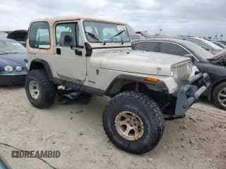 ✅ 1995 Jeep Wrangler • VIN: 1J4FY29S6SP310046 • Лот: 75213564. Опубликован ранее на Copart с пробегом 147 111 миль. Бесплатный доступ к архиву аукционных продаж из США и подробный отчёт об истории автомобиля на DreamBid. Изображение 4.