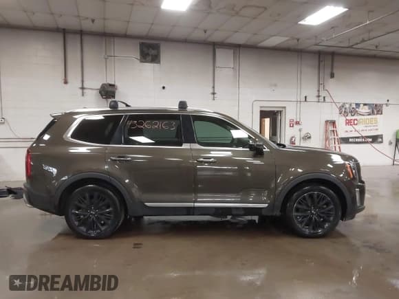 ✅ 2020 Kia Telluride SX • VIN: 5XYP5DHC1LG022593 • Lot: 43262163. Wystawiony na IAAI z przebiegiem 99 196 mil. Bezpłatny archiwum sprzedaży aukcyjnych z USA i szczegółowy raport historii pojazdu na DreamBid. Zdjęcie 13.